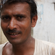 As I walked around the old city of Hyderabad, this labourer stopped working and stood still right in front of me, daring me to take his photo.